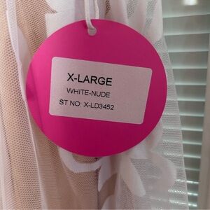 New with tags never worn nude and lace floral design dress